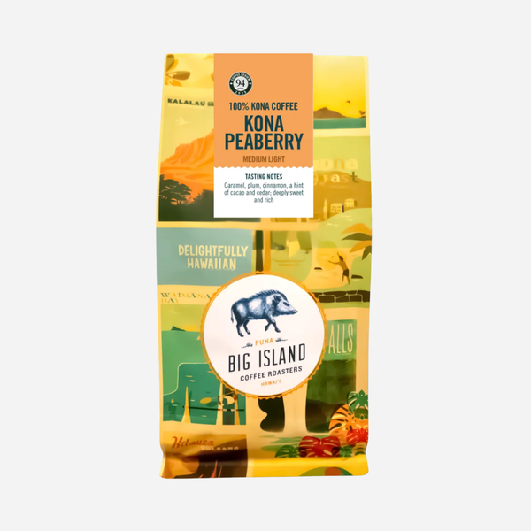 Kona Peaberry coffee package with scenic design on a white background