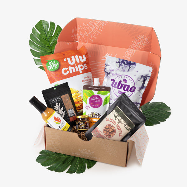 Gourmet gift box with snacks and drinks on a white background