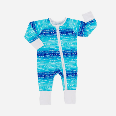 Blue and white patterned baby onesie on a white background