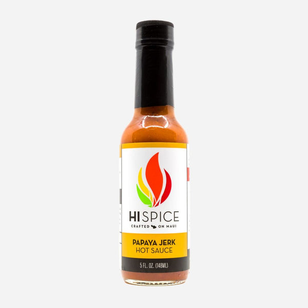 Bottle of Hispice Papaya Jerk Hot Sauce on a white background