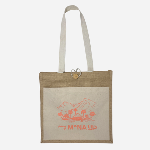 Tote bag with a mountain and palm tree design and 'House of Mana Up' text on a beige background