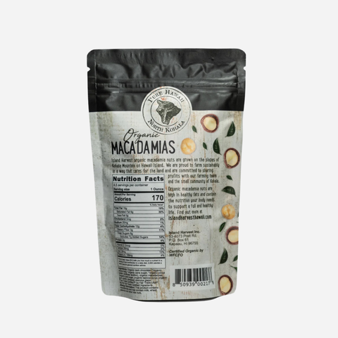 Package of organic macadamias with a visible label on a white background