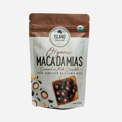 Packaging of Island Harvest Organic Macadamias covered in milk chocolate on a white background