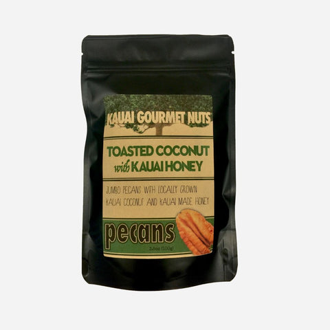 Bag of Kauai Gourmet Nuts toasted coconut with Kauai honey pecans on a light gray background