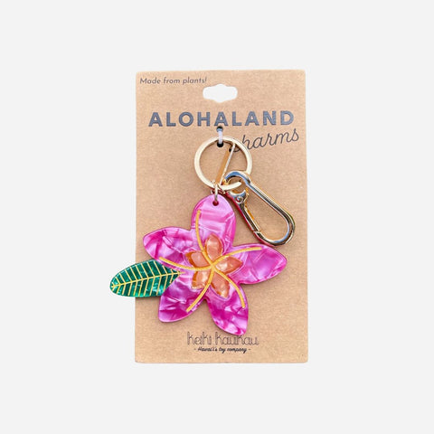 Floral keychain on a 'Alohaland' branded card with a white background