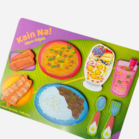 Colorful toy food set with a green tray and 'Kain Na!' branding.