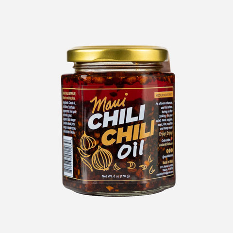 Jar of Maui Chili Chili Oil on a white background