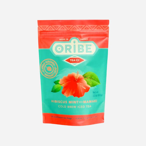 Oribe Tea Co. package with a red flower design on a white background