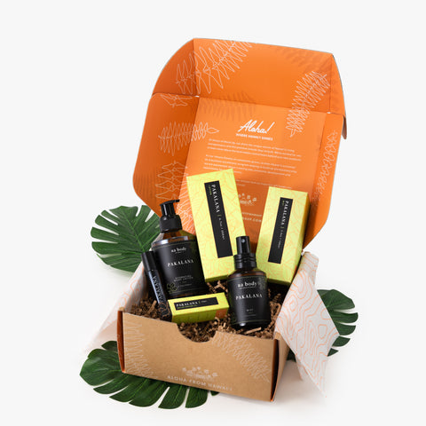 Gift set with skincare products in an orange box on a white background