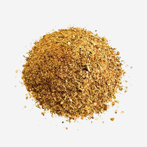 Pile of brown spice on a white background