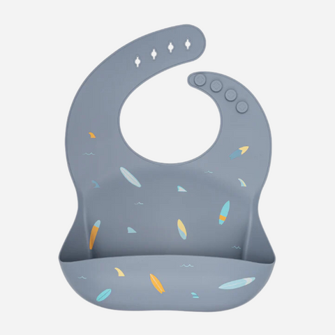 Gray baby bib with colorful patterns on a light gray background