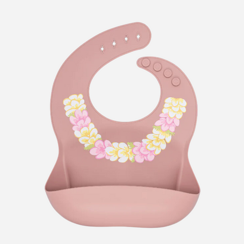 Pink baby bib with floral design on a white background