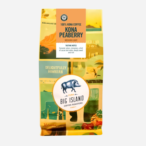 Kona Peaberry coffee package with scenic design on a white background