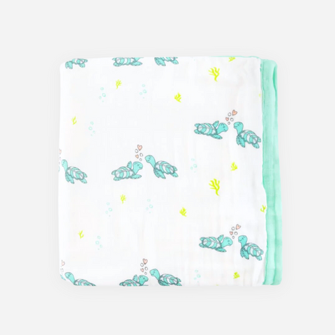 Baby blanket with turtle pattern on a white background