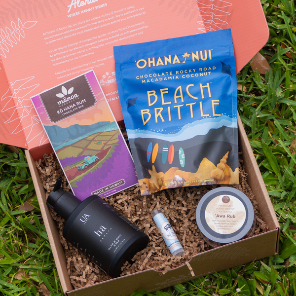 Box of Ohana Nui Beach Brittle and other products on grass