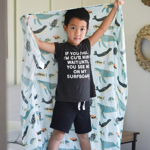 boy with ocean friends blanket