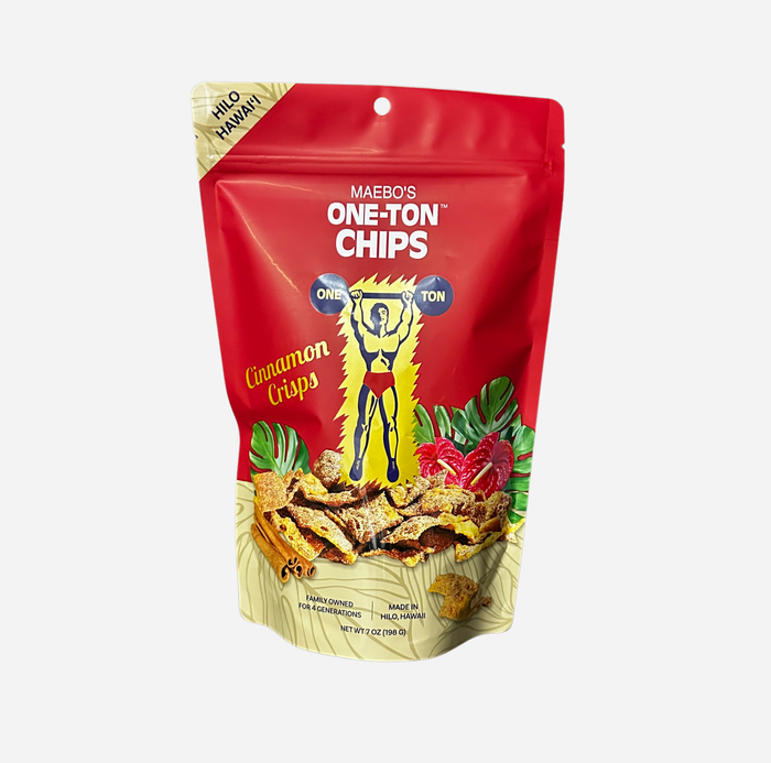 A red stand-up pouch of Maebo's One-Ton Cinnamon Chips, featuring a cartoon graphic of a person lifting weights and an illustration of the chips, set against a light gray background.