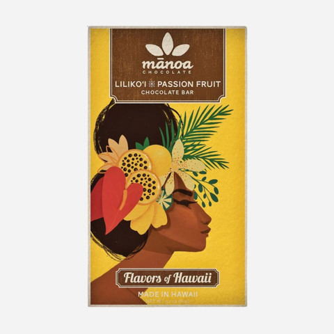 Manoa Chocolate bar packaging with a woman's face and tropical elements on a yellow background