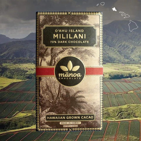 Manoa Chocolate Mililani 70% Dark Chocolate bar with a scenic background