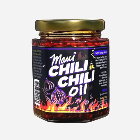 Jar of Maui Chili Chili Oil with a black background