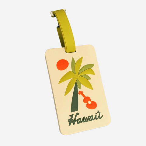 Luggage tag with palm tree and ukulele design on a beige background