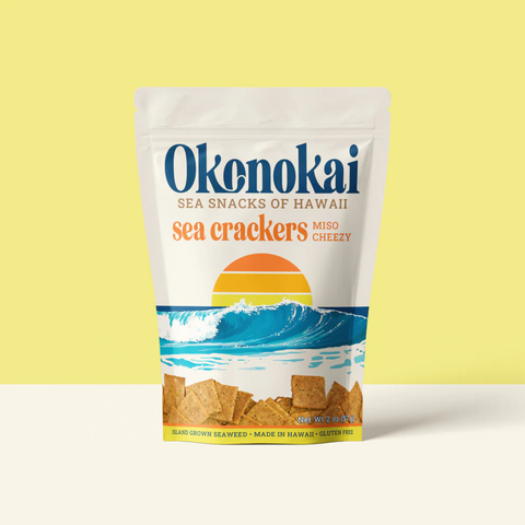 Packaging of Okenokai sea crackers on a yellow background
