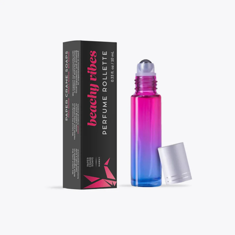 Perfume roller with packaging labeled 'Beachy Vibes' on a white background