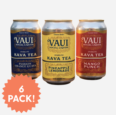 Three aluminum cans of Vauí Social Liquids Sparkling Kava Tea are shown on a light gray background, with a coral-orange starburst badge in the lower left reading '6 PACK!'. The left can is Passion Orange Guava, with a dark blue label; the center can is Pineapple Lemonade, with a yellow label; the right can is Mango Punch, with a red label.