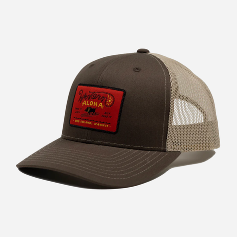 Brown and beige cap with a red patch on a white background